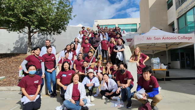 picture of students and faculty at stairs