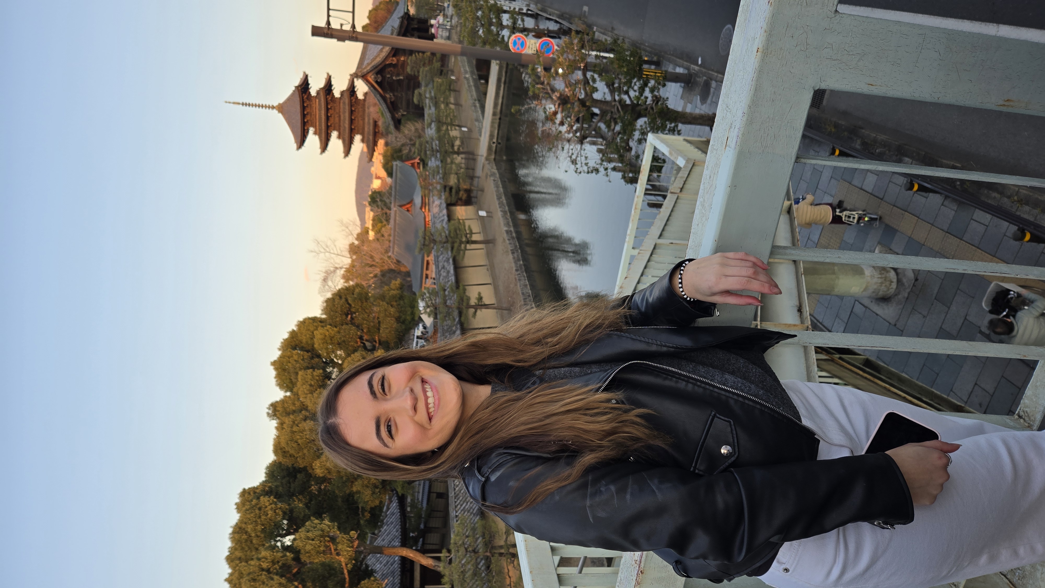 A student in front of a temple