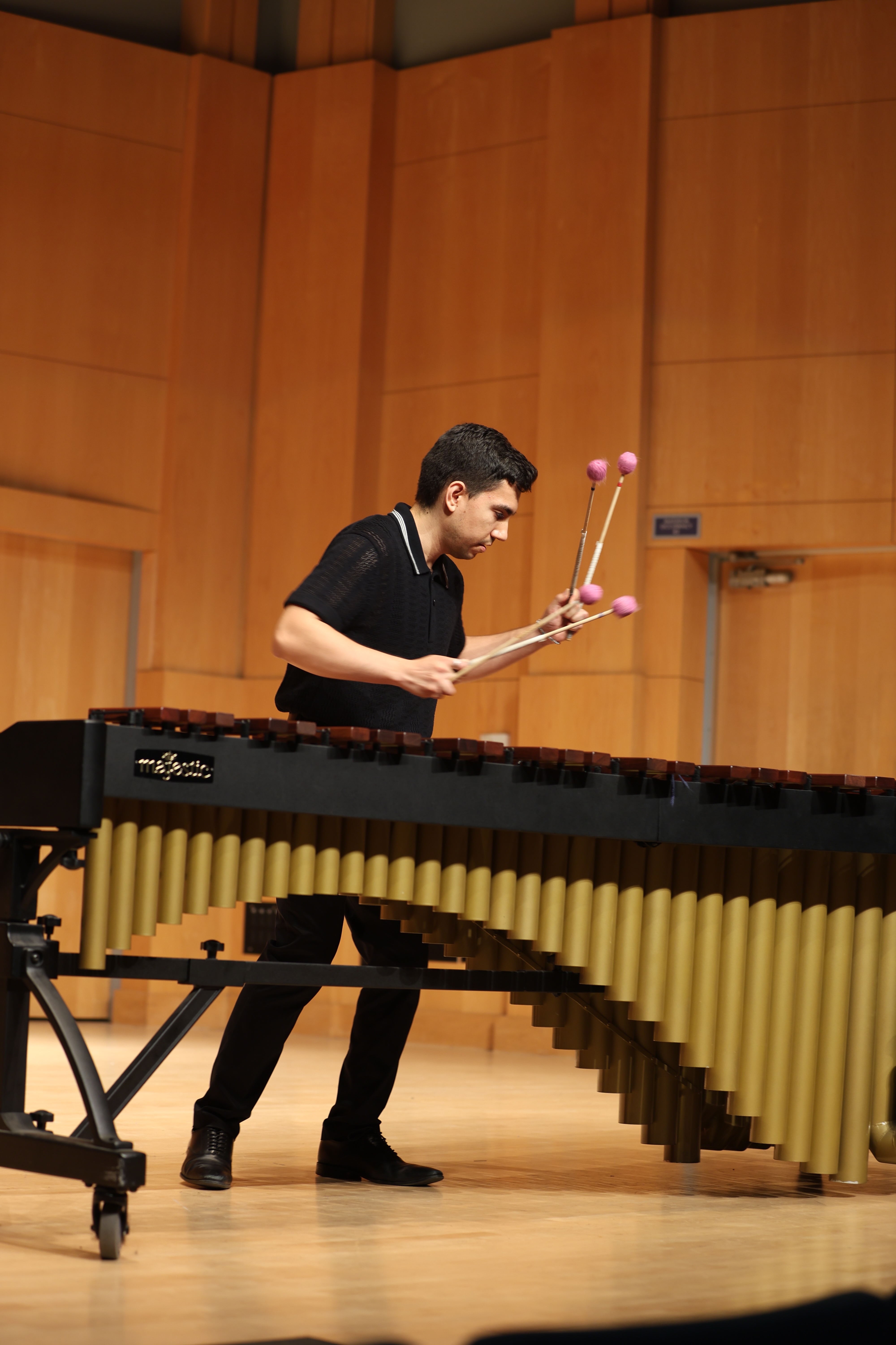 Student playing marimba