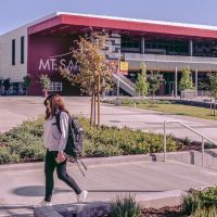student walking past student center
