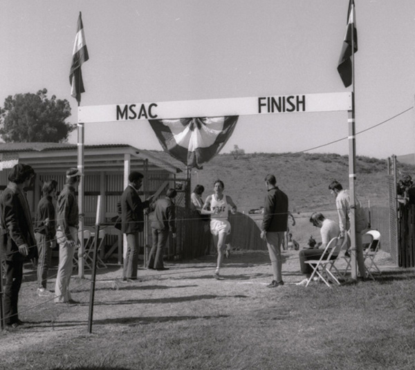 Runner crosses the finish line in 1950
