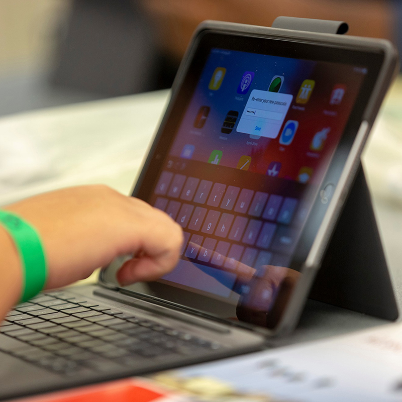 A student using a Mt. SAC-provided laptop.