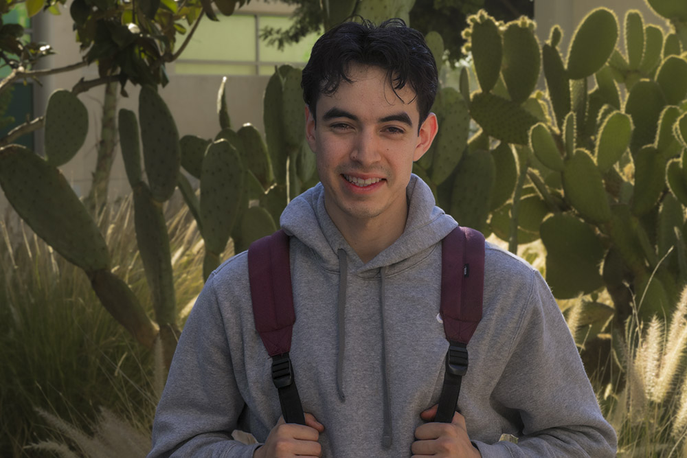 Danny Soto-Gonzalez hangs out in the garden in the Science's courtyard. 