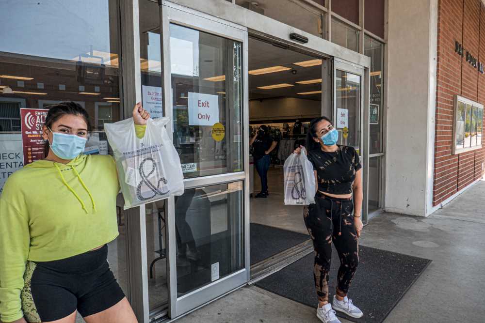 Students pick up their textbooks