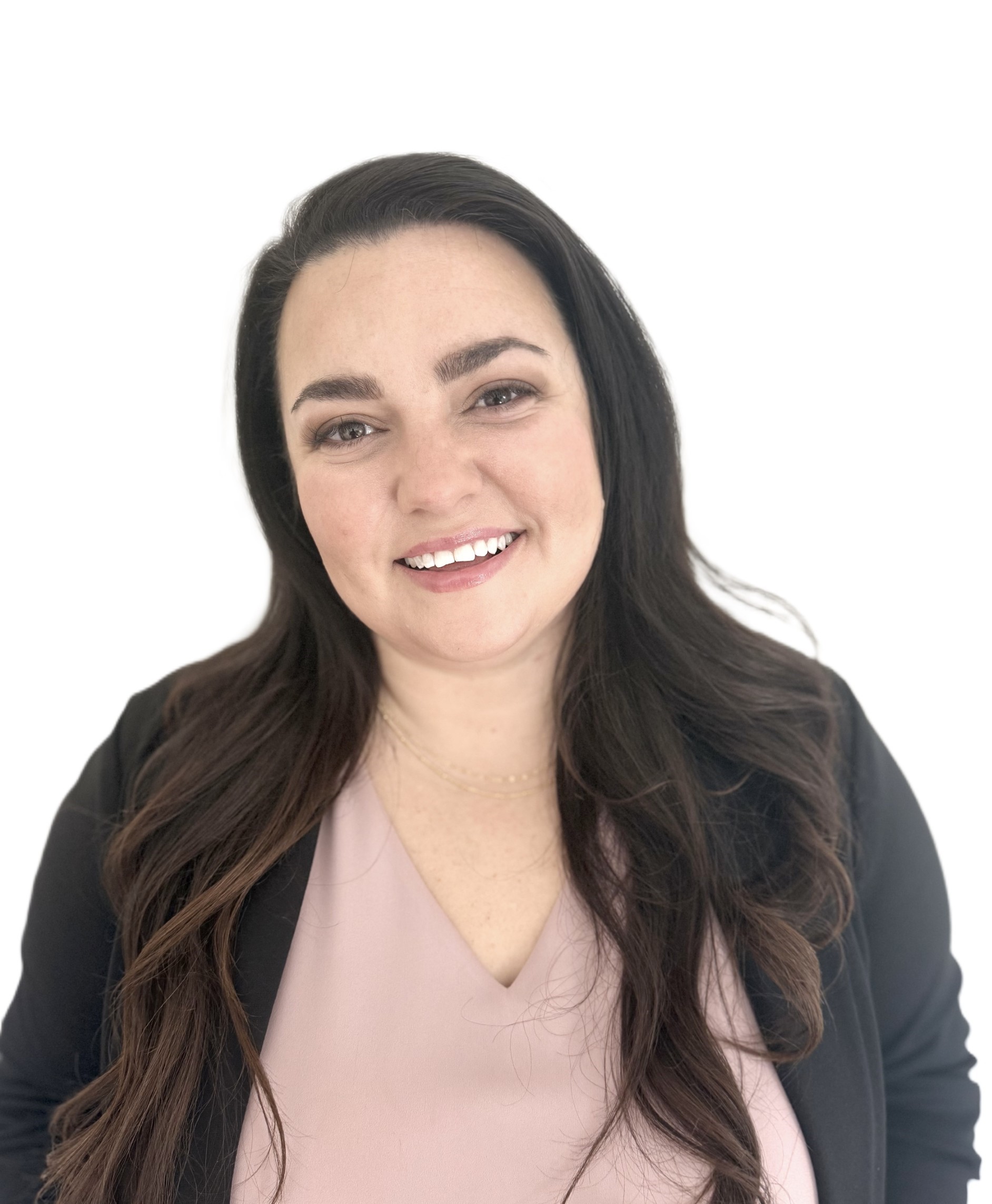 Shiloh Blacksher wearing a black cardigan and rose shirt on a white background